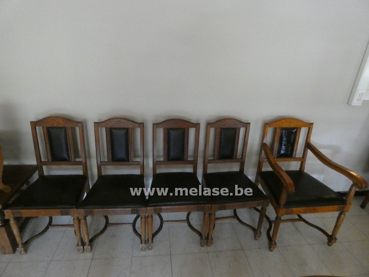 Stoelen "zwart lederen zit en rug"